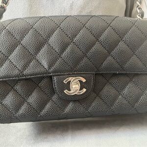 CHANEL Black Quilted Shoulder Bag with Silver Hardware